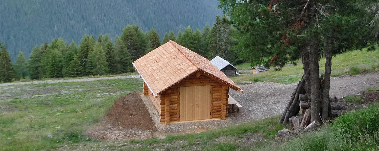 slider-almhuette-holzhaus-suedtirol-baita-alpina-casa-legno-alto-adige